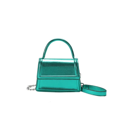 Retro style square PU leather crossbody bag in multiple colours on a model.