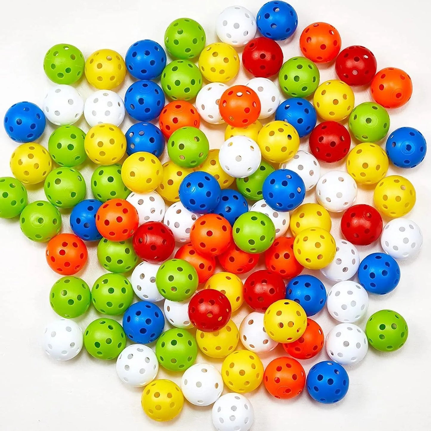 Multi-colour golf practice balls in red, orange, blue, green, white, and yellow, 42mm diameter, packed in a net pocket