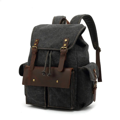 Retro canvas backpack in army green with antique bronze hardware, showing front compartments and size.