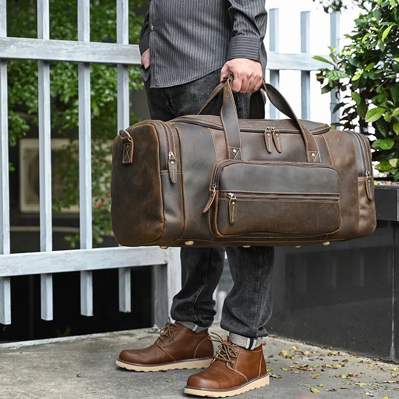 Men's dark brown full-grain leather crossbody handbag, 58cm large capacity, anti-theft, with shoulder strap.