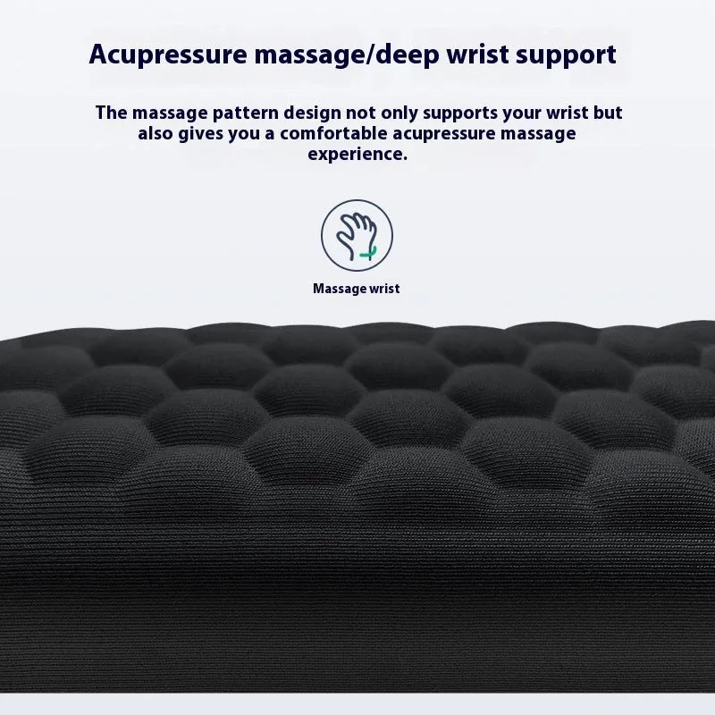 Black and grey memory foam mouse wrist rests with cloth and leather-style covers on a desk.