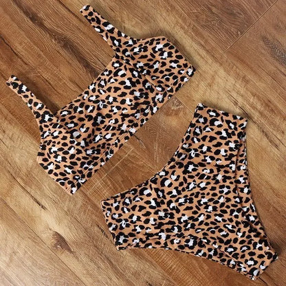 Women's leopard print high waist bikini swimsuit set on a mannequin, showing bra and briefs.