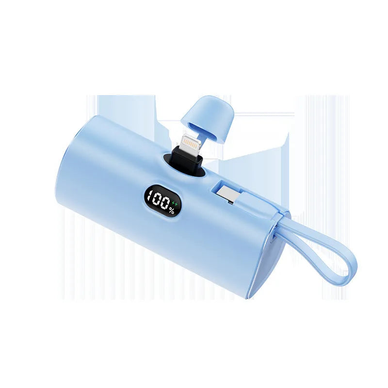 Capsule digital display wireless power bank showing battery percentage on screen, compact 79x34x26mm design with integrated plug