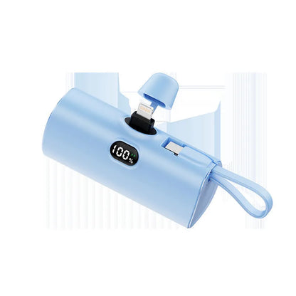 Capsule digital display wireless power bank showing battery percentage on screen, compact 79x34x26mm design with integrated plug