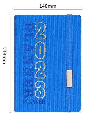 Creative student almanac diary with imitation leather cover open on a calendar page.