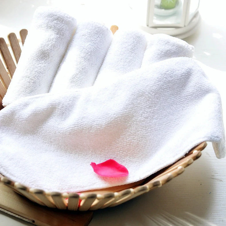 White washable diaper absorbent pad measuring 33cm by 13cm with two-layer microfiber construction
