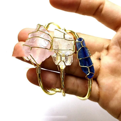 Unshaped natural crystal rough stone bracelet with gold winding metal accents in geometric design