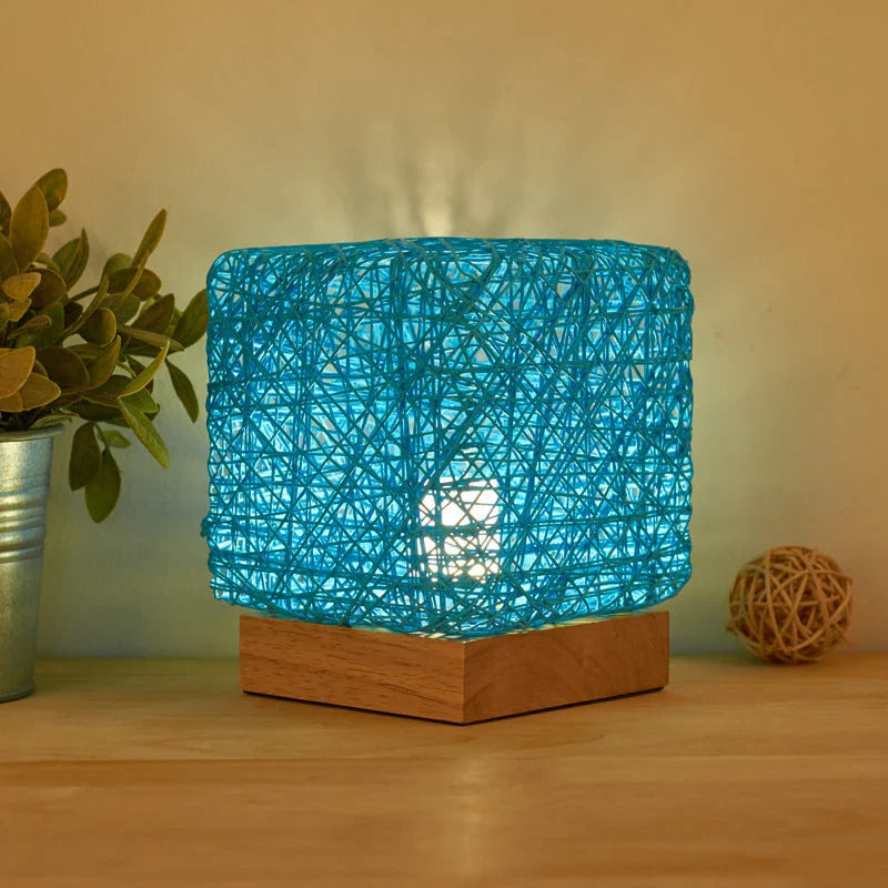 Elegant bamboo rattan desk lamp with dimmable LED lighting and USB charging capabilities