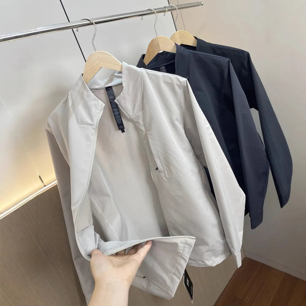 Men's stand collar casual jacket in polyester, shown in a neutral colour with straight hem and long sleeves.
