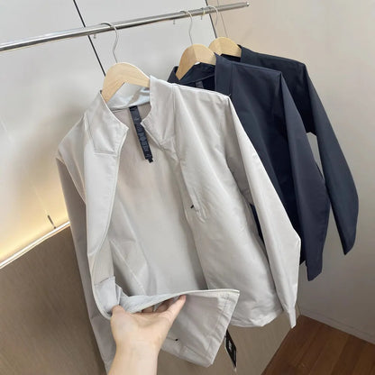 Men's stand collar casual jacket in polyester, shown in a neutral colour with straight hem and long sleeves.