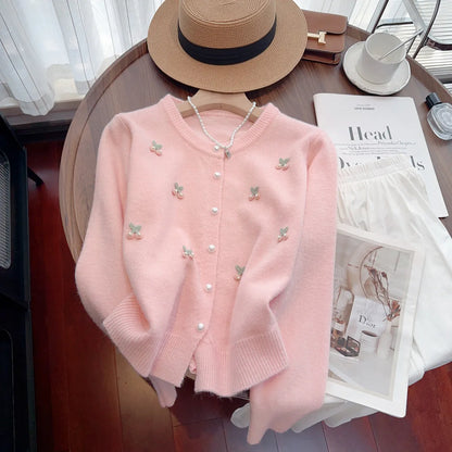 Cardigan-style sweater coat with round neck and beaded decoration in slim fit