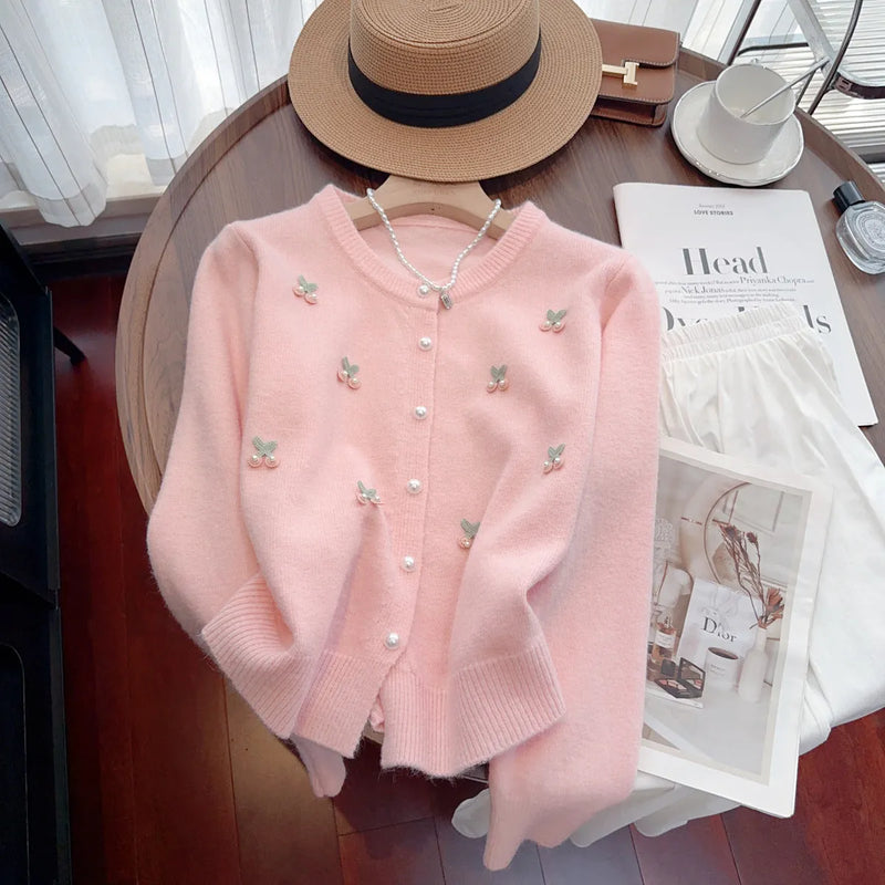 Cardigan-style sweater coat with round neck and beaded decoration in slim fit for fresh sweet style wardrobe pairing, made from nylon fabric in free size range suitable for 80-120 cm builds, available in pink, red, white and blue colour options