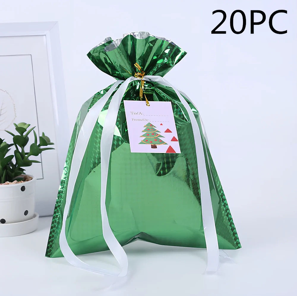Christmas gift bag with drawstring closure in laser gold finish, 32x24cm dimensions