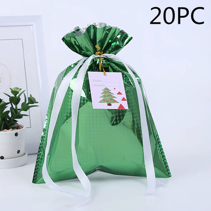 Christmas gift bag with drawstring closure in laser gold finish, 32x24cm dimensions