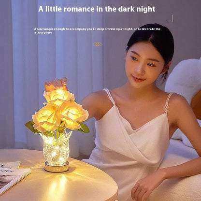 Modern crystal flowers design rechargeable touch table lamp with dimming control on a bedside table.