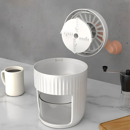 Green hand-cranked ice shaving machine with removable ice box and ergonomic handle