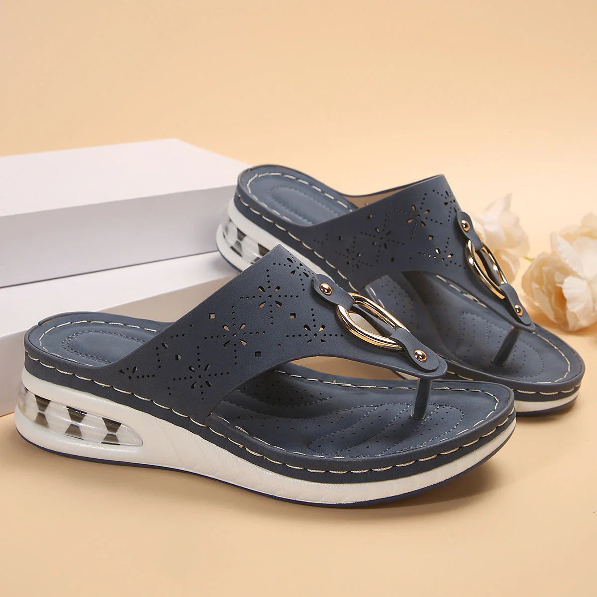 Stylish women's air cushion wedge sandals in various colors and sizes, featuring herringbone toe design and metal buckle accents