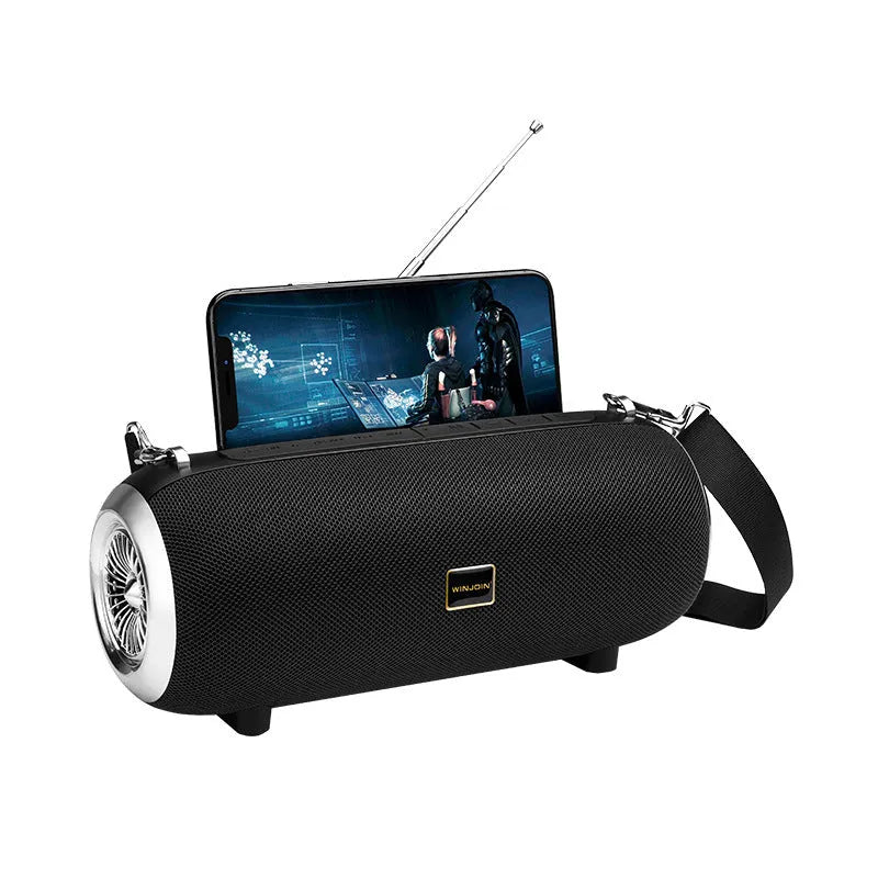 F666 Mini portable Bluetooth speaker in black with retractable FM antenna and shoulder strap.