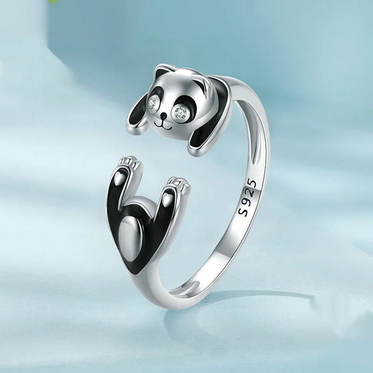 Adjustable panda open ring bracelet in sterling silver with white gold plating, showing animal modelling details and open design