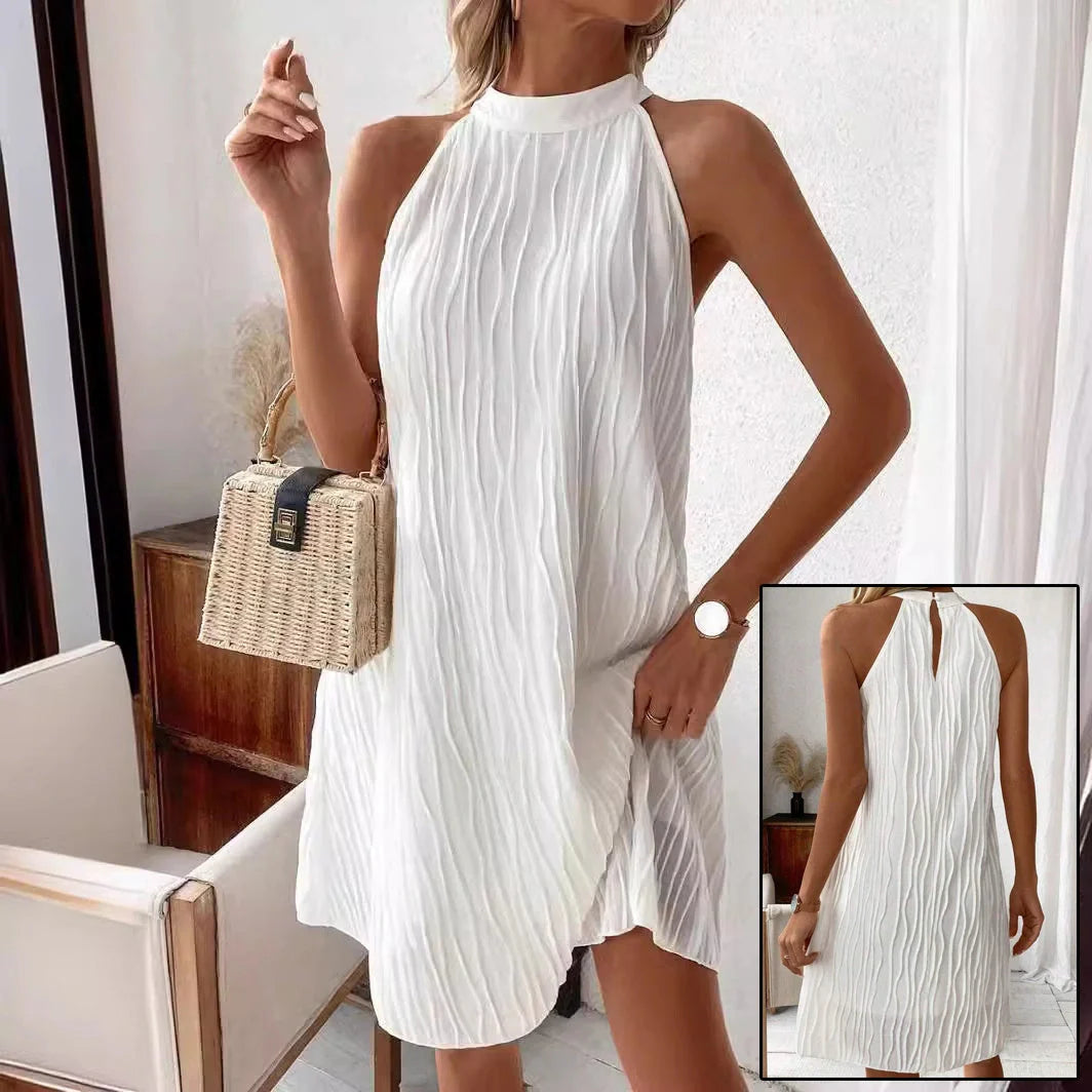 Women's white halter backless dress with umbrella skirt, perfect for any occasion