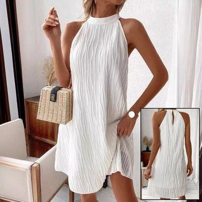Women's white halter backless dress with umbrella skirt, perfect for any occasion