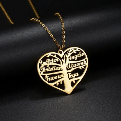 Custom stainless steel name necklace with hollow heart tree pendant in gold, rose gold, or silver on a chain.