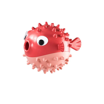 Green fish-shaped interactive dog toy with treat dispensing feature and internal bell for medium large dogs