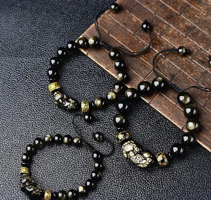 Hand-woven golden obsidian Pi Xiu bracelet with animal design, showing bead size options.