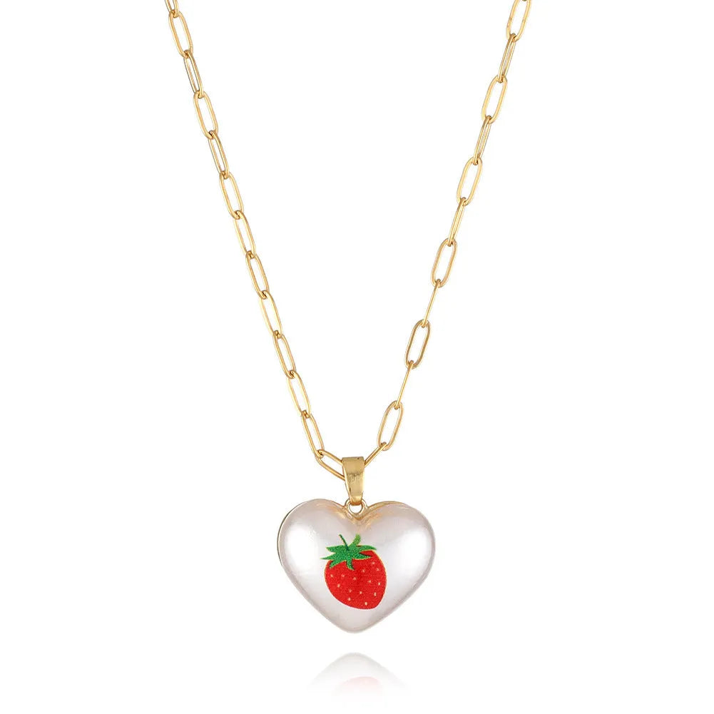 Geometric heart-shaped fruit pendant necklace on an adjustable metal chain