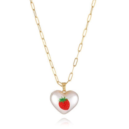 Geometric heart-shaped fruit pendant necklace on an adjustable metal chain
