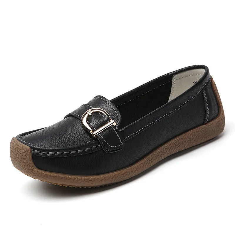Women's beige casual loafers with round toe and flat heel on a white background.