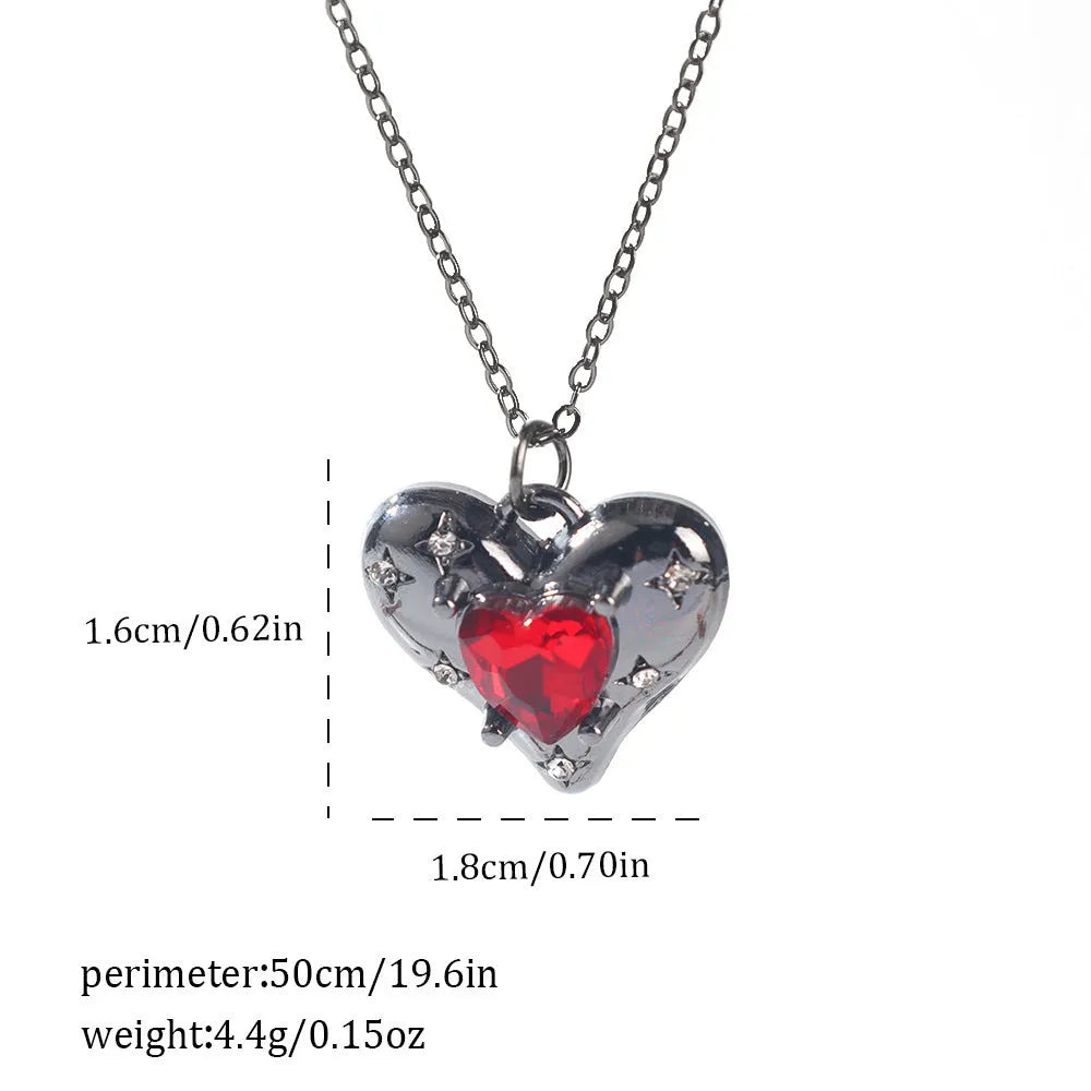 Gothic style zinc alloy necklace with bat pendant on a silver chain against dark background.