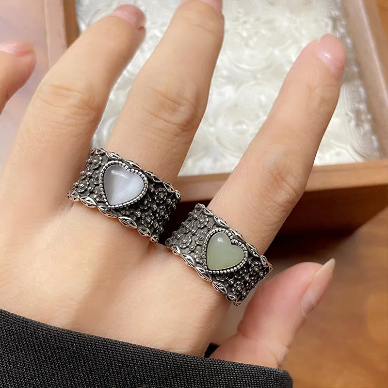 Retro wide-faced heart-shaped silver ring with adjustable opening in white or green colour