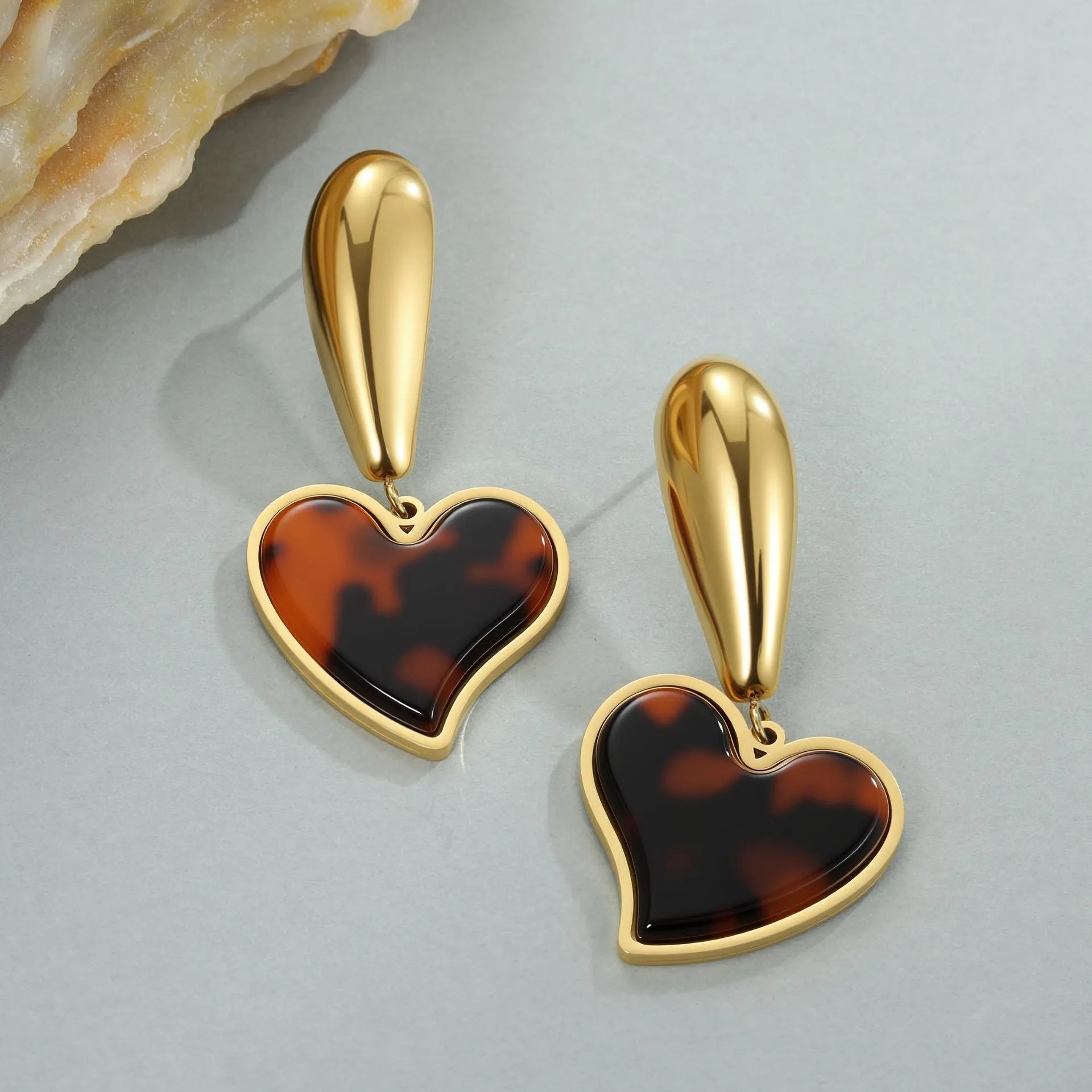 Women's tortoiseshell resin hawksbill colour earrings with 18K gold electroplating on stainless steel, showing heart-shaped and floral designs