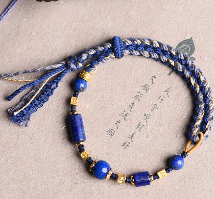 Hand-woven DIY watch band in flexible wire showing ethnic design details