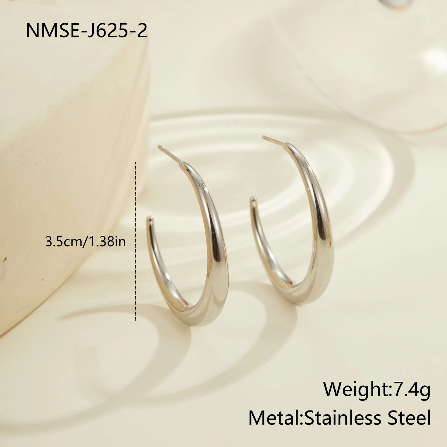 Women's stainless steel hoop earrings in two sizes with gold or steel finish