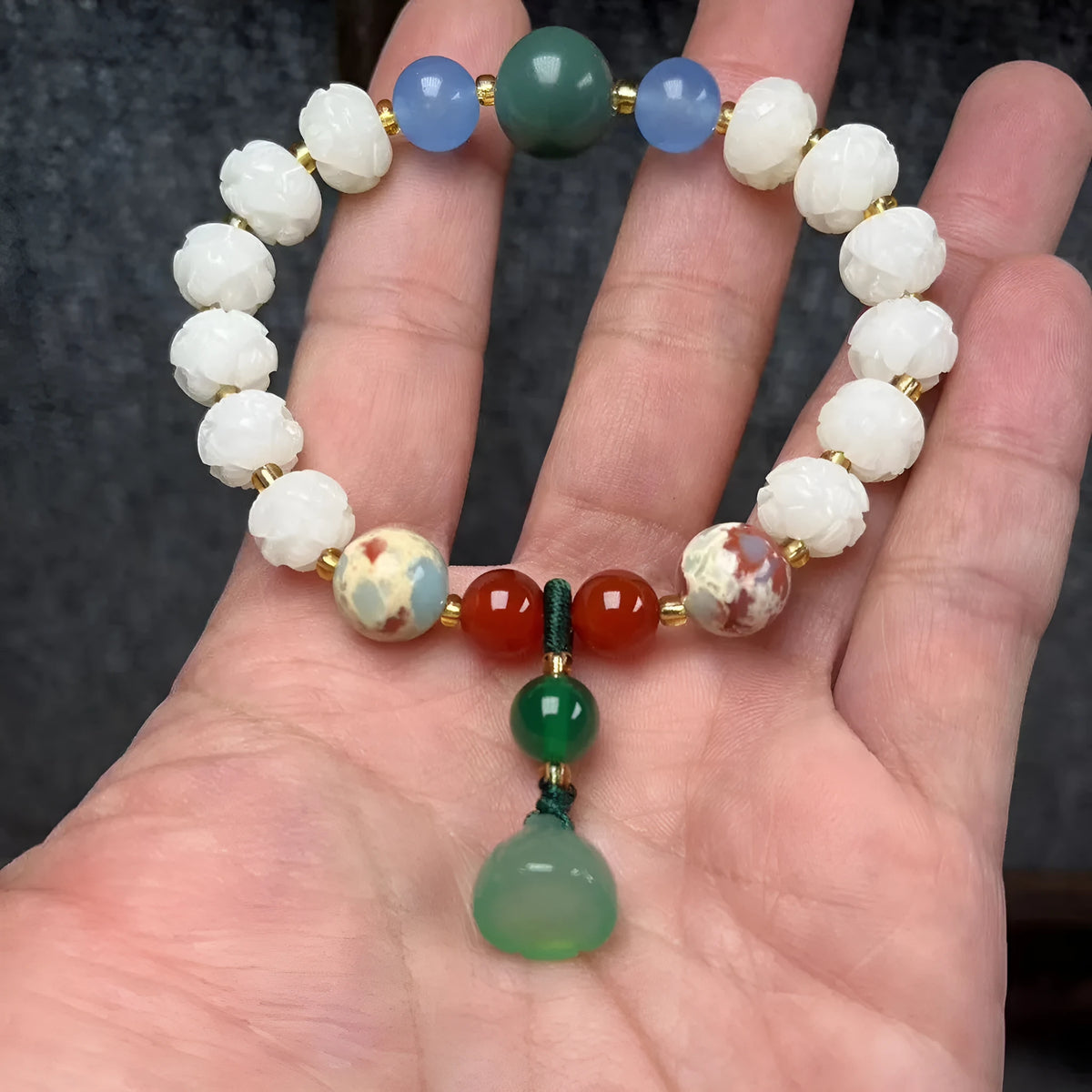 White Bodhi root bracelet with carved pumpkin lotus beads including Apple Orchard and Duobao styles