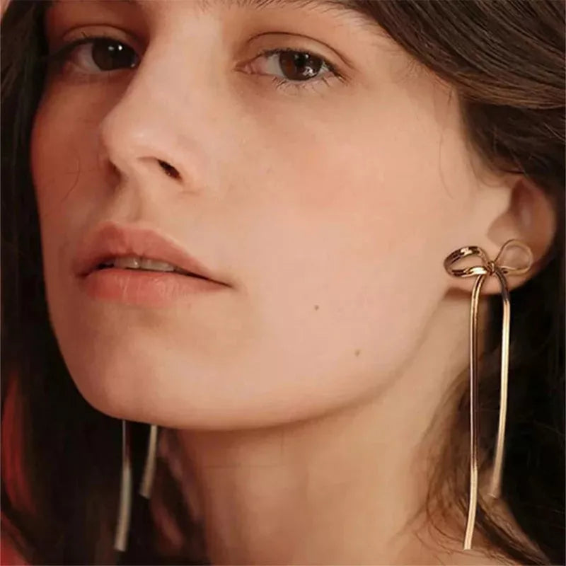 Trendy bowknot stainless steel gold plated snake chain necklace for women