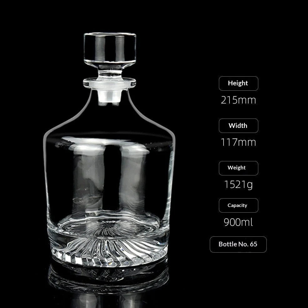 Hand-cut Bohemian crystal whiskey decanter with retro design and tapered pouring neck on wooden bar