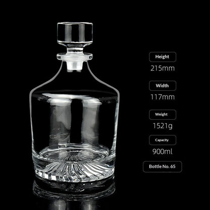 Hand-cut Bohemian crystal whiskey decanter with retro design and tapered pouring neck on wooden bar