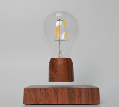 Magnetic levitation bulb floating above imitation wood base with international plug options