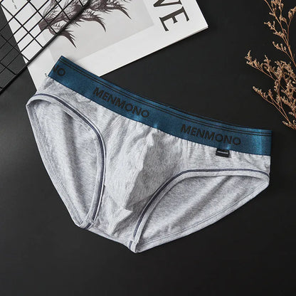 Men's low waist cotton briefs in a two-tone colour option on a plain background