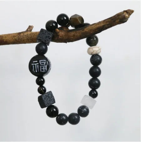 Hand-woven natural black agate ceramic bracelet with geometric design and round elements