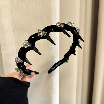 Velvet and crystal embellished high-head hairband in a choice of colours on a white background.