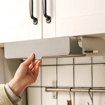 Gray kitchen storage rack with six seasoning bottles mounted on wall using punch-free adhesive system