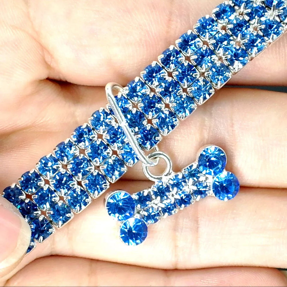 Adjustable bling rhinestone dog collar for small to medium pets in blue, white, and pink
