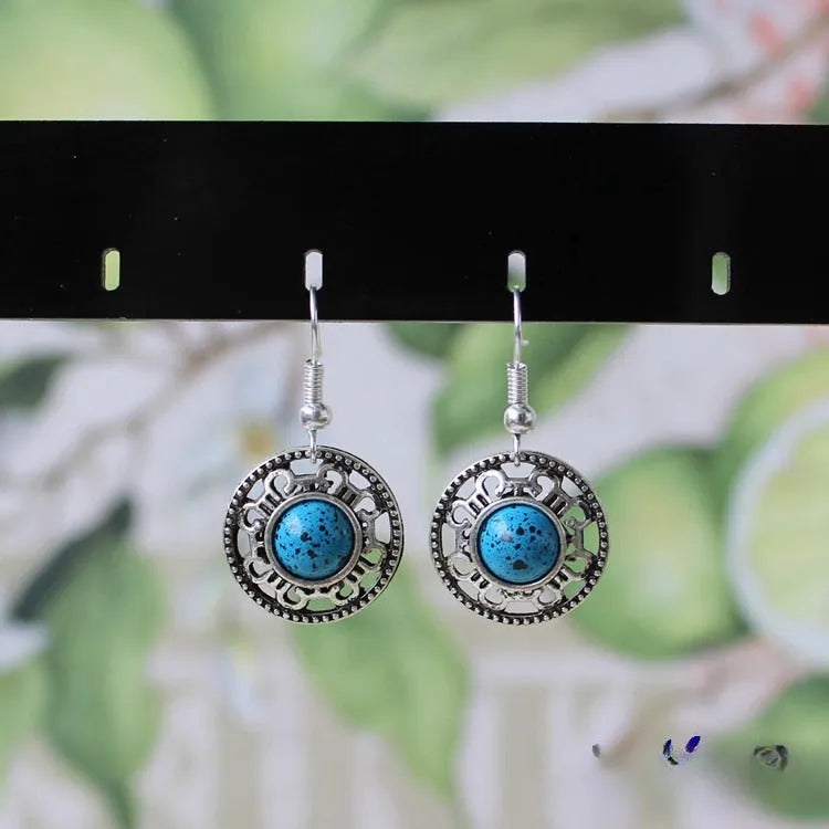 Handmade Miao silver retro turquoise flower disk earrings with geometric totem patterns