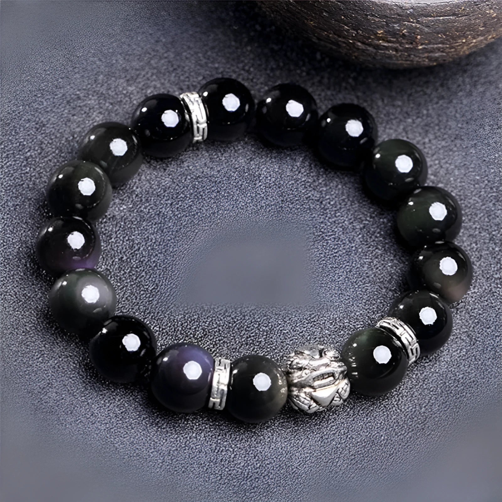Silver 999 natural obsidian bracelet with cloud year design, shown in 10mm and 12mm unisex sizes.