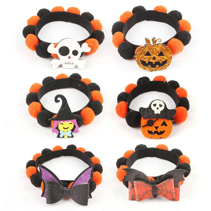 Halloween fur ball pet collar with pumpkin, pirate, witch and skull designs in six colour options