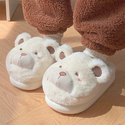 Women's plush suede slippers in cartoon design showing round toe and available colour options